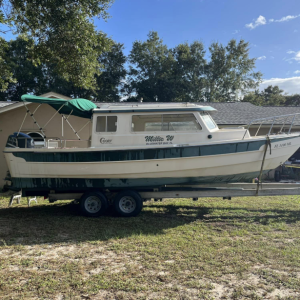 Media 'Quick clean after getting her home' in album 'My \"fixer upper\" 25 cruiser the day I bought her. She had sat on a lift through hurricane Sally and needed some love.'