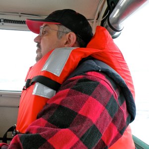 Brian at the helm in Fritz Cove on Labor Day