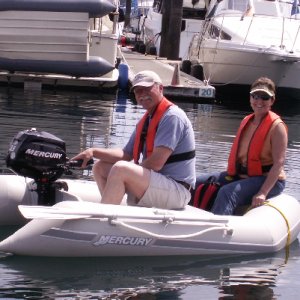 Russ and Toni (Traveler) in Dinghy