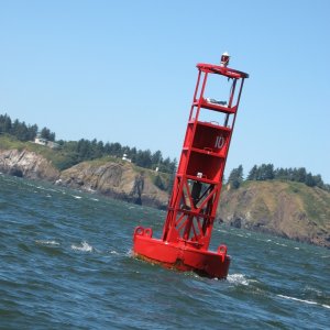 The infamous Buoy 10, and Cape Disappointment Lighthouse beyond