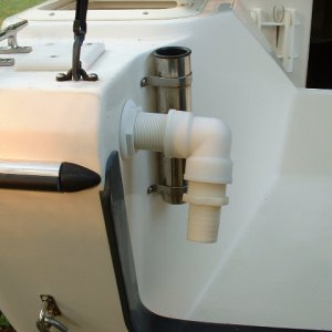 Since the pump runs continuously, filling the tank faster than the drain tube allows, this fitting dumps excess water overboard. A plastic mesh screen prevents bait from going out. The previous owner reports that bait stays alive a very long time...because of the continual supply of fresh, clean water circulating in the tank.