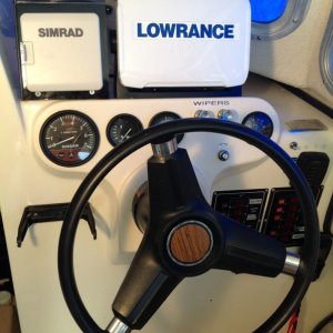 Beagle Helm with hydraulic steering, Lowrance Gen 2 touch, and Simrad autopilot.