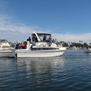 some different  counted 12 folks on deck, not sure how many below.  odd design, no inside helm