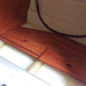 Added plywood supports painted with 2 coats of penetrating epoxy tabbed to hull with epoxy and strip of glass. The missing section at the top left is necessary to get the correct height at the front.