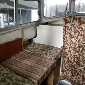 Fold Down Table makes small bed for grandkid 48" in length, good to about 8 or 9 years old.