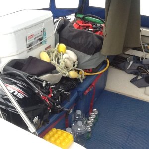 6 hp Suzuki, Honda 2000 generator, containers holding 6, 6 gal gas containers, in behind the large gas containers, one 5 gal diesel container, one 5 gal gas container, one 2.5 gal gas container, dingy fuel tank, 300 ft 3/8 three strand line with shackle,  dingy tow rope, folding chairs, ice chest, shore power/generator electrical cord,  50 ft foldable water hose & misc more in gunnel