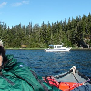 Coming back to the anchored Hunkydory after exploring Kootznahoo Inlet in the dingy.  The 13 foot Kaboat with 6 hp Suzuki motor will do 11 mph with JoLee & I & 14.5 mph with just me & run in very shallow water.