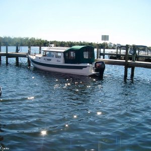 FOR SALE in Fla.  New motor, sound hull, new canvas, where do I sign?