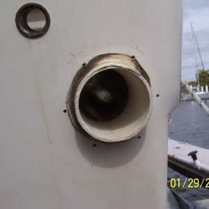 After removing the flapper the thru hull drain protruded outside about 5/8" and I didn't want to cut it off.  So I ordered a 3/4" spacer (they also make a 1/2" spacer) to go on around the drain.
