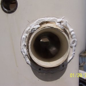 I premarked and drilled the holes and then caulked the perimeter and around each hole.