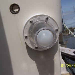 Media '6 stainless steel screws, wipe the caulking off and you are done.' in album 'The old rubber flappers had warped allowing water back into the cockpit area, so I decided to replace them with Rabud ball scuppers.'