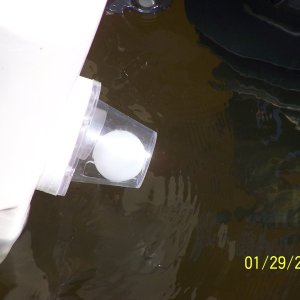 Media 'The finial product sitting in the water.' in album 'The old rubber flappers had warped allowing water back into the cockpit area, so I decided to replace them with Rabud ball scuppers.'