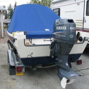 Cover rolls up and stores on top of cabin