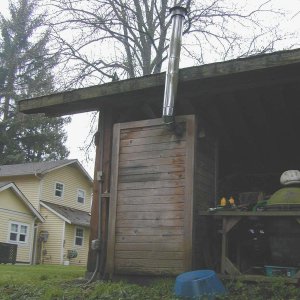 (Mason C. Bailey) Looking up at the back from the fire pit