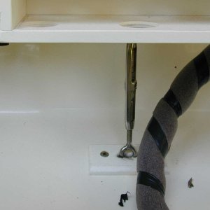 (Mason C. Bailey) 
Stainless toggle support of storage box.
