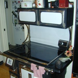 Our new Induction cook top on our old stove 2011.  If you haven't heard of Induction cooking, look it up, it's as fast as gas!