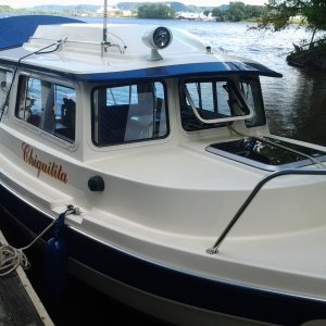 Chiquitita docked at the boat house