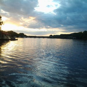 View looking up river from the boat house deck