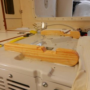 Media 'The first thing I did was epoxy some "feet" on the bottom of the AC.  There are "hooks" cut into the feet to sit on the window frame.  These are glued down with 5200.' in album 'The first thing I did was epoxy some "feet" on the bottom of the AC.  There are "hooks" cut into the feet to sit on the window frame.  These are glued down with 5200.'