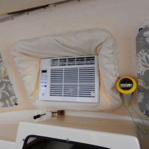 Media 'Here is the "in use" AC.  Kind of a cheezy '70's look with the fluffy opening cover, but I'll get used to it as it is blowing out cold air, I guess....' in album 'The first thing I did was epoxy some "feet" on the bottom of the AC.  There are "hooks" cut into the feet to sit on the window frame.  These are glued down with 5200.'