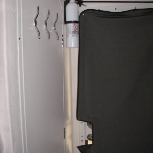 Outside view of hooks.  I am putting a couple more on the door jamb forward of these.