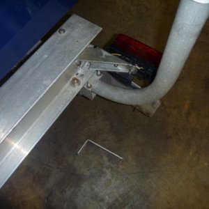 Added gussets to light and licence plate bracket. Next need to add a loop of stainless steel stranded wire to loop around the frame and licence plate. The new bracket is also thicker adding the bottom gusset was a loser as it had to be cut away some to clear a bolt. The old bracket is laying on the floor
