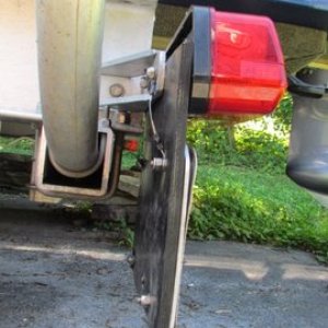 side view of finished project, note plastic backing plate in between the license plate and the conveyor belting