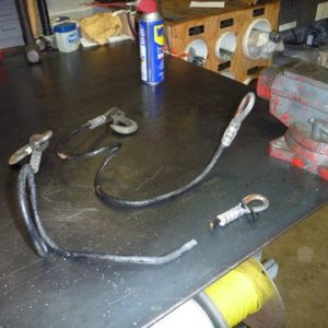 Retaining cable fails in half hooking up in 11 degree weather. Coated cable looked to have had corrosion caused by road salt just past the crimp. Removed and replaced with chain