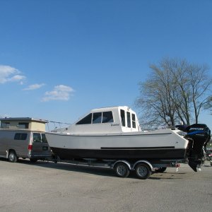 (Zydecomo) E250 camper van with new Tom Cat 4/05.  Looks Big but is easy and predictable to tow.