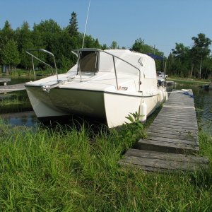 Media '(Zydecomo) Mowing the dock Trent Severn' in album '(Zydecomo) E250 camper van with new Tom Cat 4/05.  Looks Big but is easy and predictable to tow.'