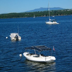 Media 'Solar Paneled Boat' in album '(Zydecomo) E250 camper van with new Tom Cat 4/05.  Looks Big but is easy and predictable to tow.'