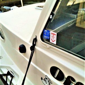 Adding an eye near the front of the helm or navigator window makes placing a fender easier when docking