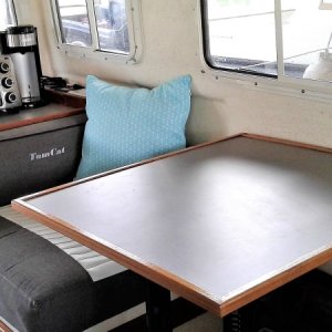 Upgrading table, galley and toaster/Coffee maker counter to color coordinated Formica dresses up the interior and makes cleaning easier