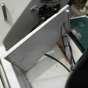 "Bridge on edge showing underside and wood piece that keeps it in place.