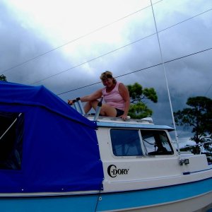Media 'Judy is on top of the final Camper Top  fitting.
Total Cost of Materials was $704.00
Total Hours of Production was 48
Free Labor of Talented Lady..Priceless' in album 'Lazy Day on the Water'