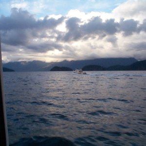 Just before entering Roscoe Bay. As soon as we finished dinner an intense thunderstorm hit - lighting, thunder, hard downpour, and some hail. But we were secure.