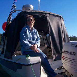 (seabran) Karen on stern of SeaSpray - Squirrel Cove, Cortes Island.