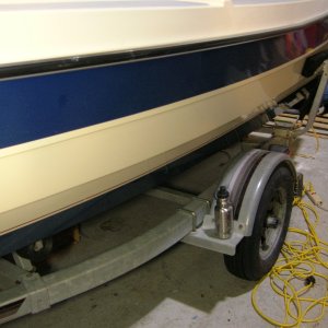 Standard EZ Loader single axle roller trailer with side guides and Spare tire.