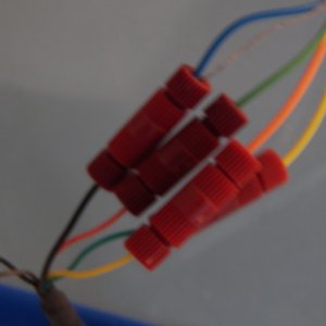 I found that these Posi-Locks work great when dealing with tiny wires, like for LED lights, etc.  This is my NMEA VHF/GPS connection, which is AWG 22 wire.  Easily changed around and splicing several wires together is simple (like the top one with blue and silver both going to ground).