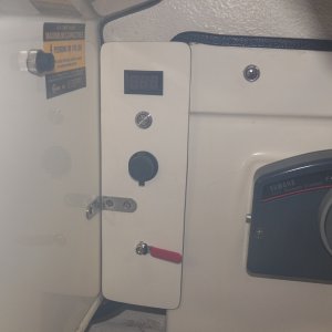 This panel is my gas shut off, a cigarette lighter socket (for cell phone charger, etc.), and a digital battery charge indicator with a push button switch.