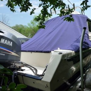 Media 'uses same snaps as camper top.' in album 'slant back canvas to keep cockpit clean and dry. Shares the zipper and snaps on rear of cabin with camper top obviously when camper top is not being used'