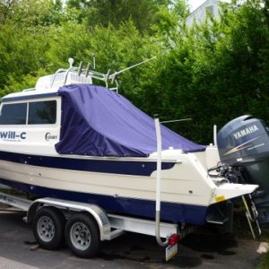 Media 'Just zip the top edge on do some snaps and wala,clean boat' in album 'slant back canvas to keep cockpit clean and dry. Shares the zipper and snaps on rear of cabin with camper top obviously when camper top is not being used'