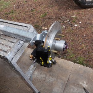 Axle and brakes are the same manufacturer.  Simple, perfect fit.