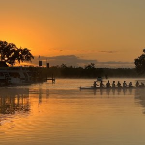 Sunrise over rowers at Hontoon