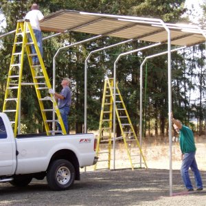 (CatyMae n Steve) Wow, that's tall!  Steve's on a 12 foot ladder in the bed of the truck!