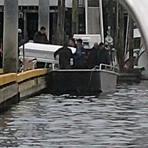 a skiff filling as a Hearse