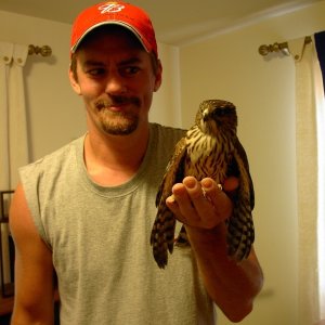 (Sea Wolf) My son Mark and a raptor he rescued and set free!