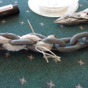 Chain/Rope Splice: Two strands that are woven into the chain are also sewn together where they cross at each chain link,