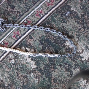 Chain/Rope Splice: The completed splice lacks the bulging doubled-up section where all three strands are woven back into the rope.  This passes much more easily through the windlass, which can jam on the standard type of splice.