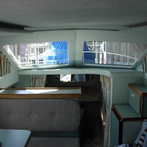 A look back to review how the floor plan is laid out.  No bare or painted fiberglass anywhere visible inside cabin.
